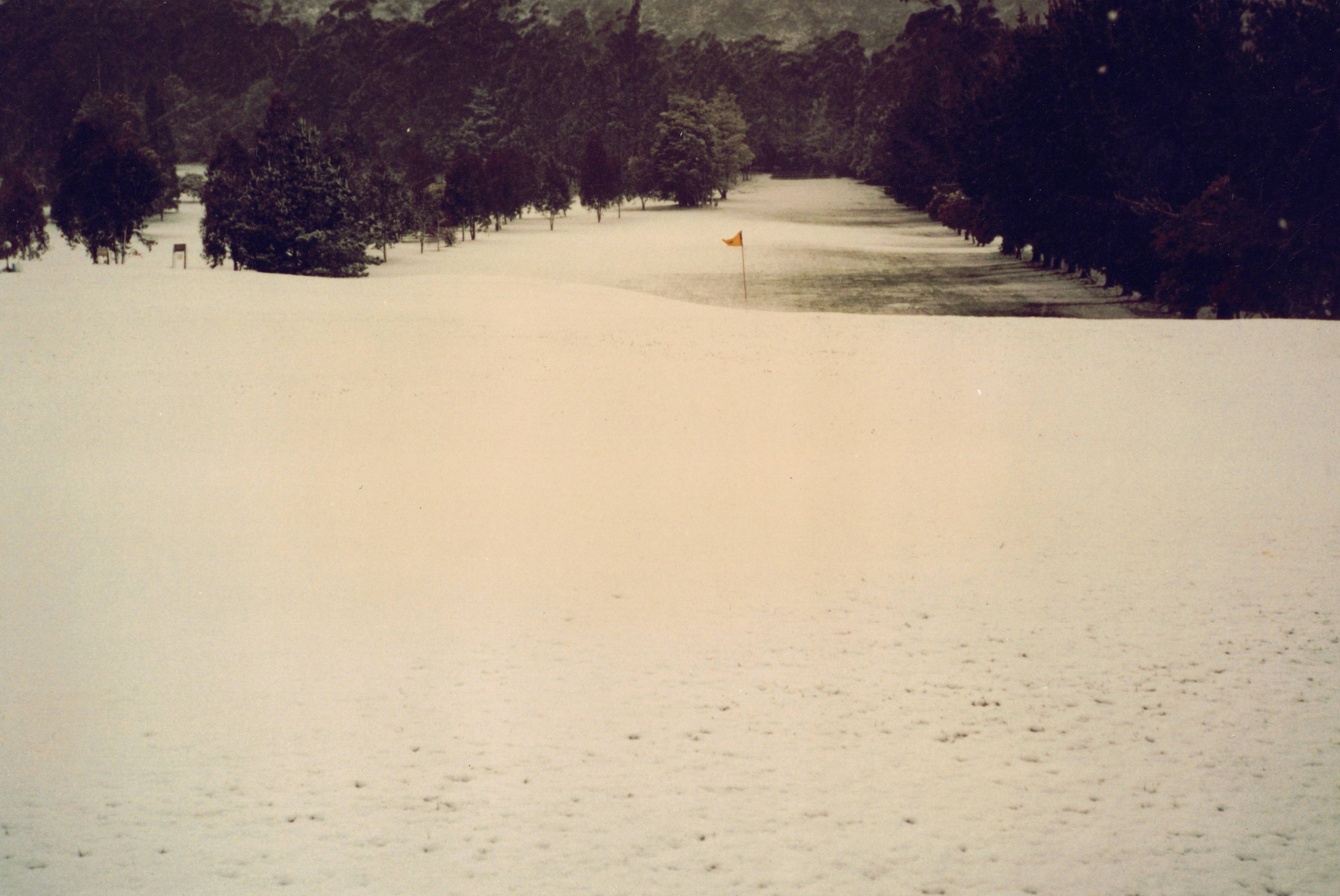 Snow on Third Third Green back to Tee